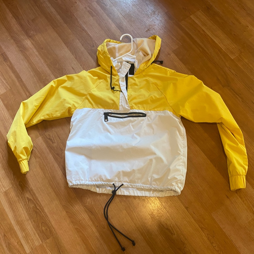 yellow and white wind breaker